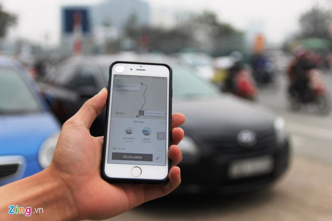 Tai xe Uber, Grab Ha Noi: 'Muon ve nha chac phai xe logo' hinh anh 2