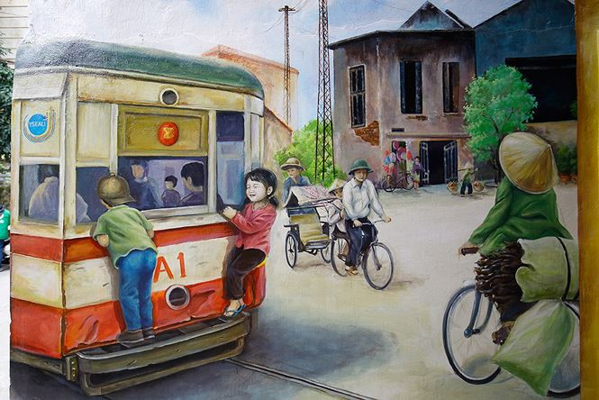 Chung cư cũ H&agrave; Nội sống động nhờ tranh b&iacute;ch họa cỡ lớn - ảnh 12