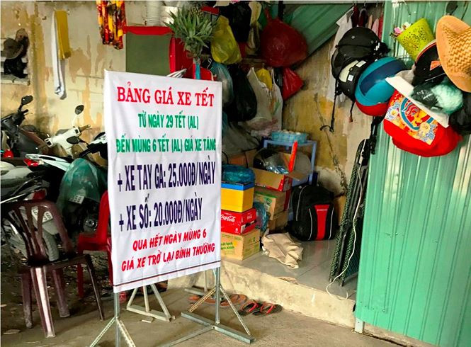 'Chặt ch&eacute;m' người gửi xe m&aacute;y dịp Tết quanh bến xe ở S&agrave;i G&ograve;n - ảnh 3