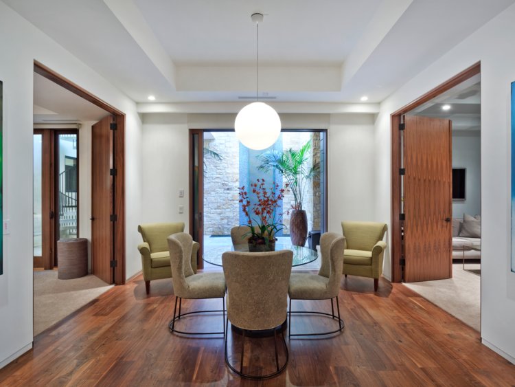 Electronic systems to control the lighting, environment, and audiovisual devices are integrated into the home.