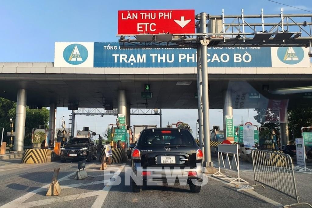 Một làn thu phí không dừng tại Trạm thu phí Cao Bồ. Ảnh: Văn Xuyên/BNEWS/TTXVN
