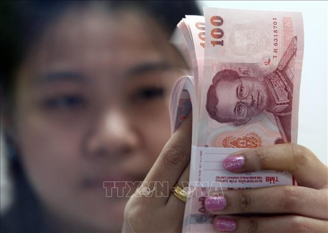 Đồng baht Thái Lan . Ảnh: AFP/TTXVN
